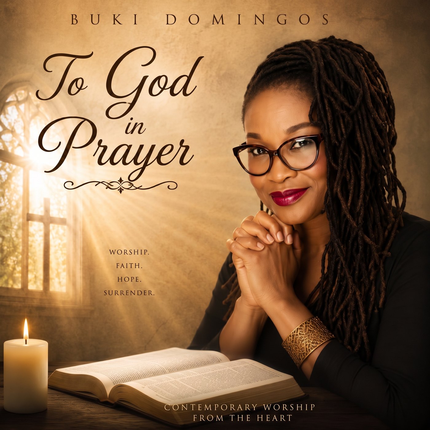 Album cover: To God in Prayer by Buki Domingos. She sits at a table with her hands clasped, a Bible, a candle and a stained-glass window behind her.